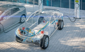 A transparent electric vehicle plugged into a charging point showing the inner workings