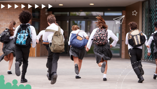 Seven school children, running into a school wearing backpacks. There are doodles overlaying the image of paper aeroplanes and stars.